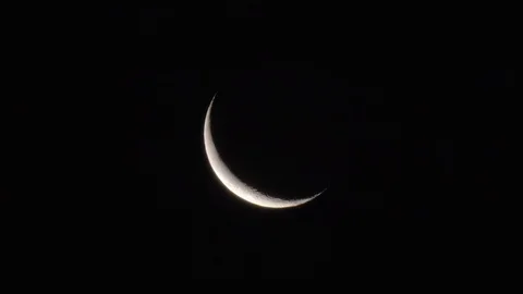 Crescent Moon in the Night Sky Stock Footage 109656878
