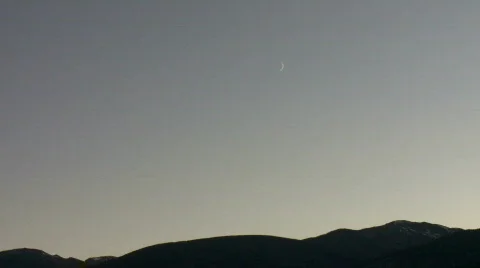 Crescent moon over mountains Stock Footage 877221