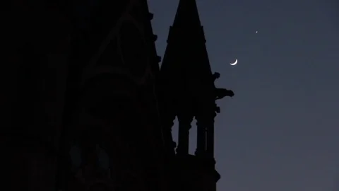 Crescent Moon &amp; planet pass Cathedral minaret closer view Stock Footage 75016076