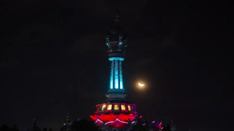Crescent Moon Setting Behind Bajra Sandhi Monument in Denpasar, Bali Time lapse Stock Footage 199749257