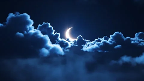 Crescent moon shining through night clouds for Ramadan and sleep music back.. 스톡 동영상 343214793