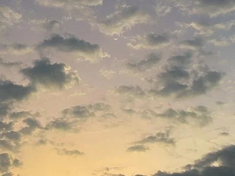 Crescent Moon at Sunset Sky Stock Photos
