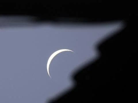 Crescent Moon in the Twilight Sky Stock Photos