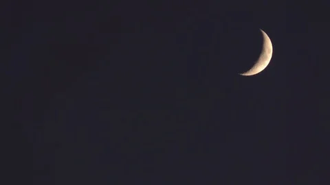 Crescent peach moon in night sky Stock Footage 88962869