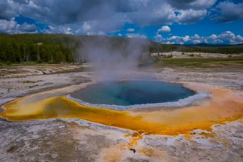 Crested pool hot spring and orange microbial mat in the old faithful geyser 写真素材