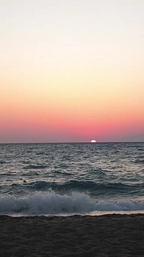 Cretan Sunset Over the Sea with Distant Island Stock Footage 303437455