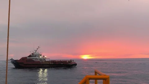 Crew boat reverse with in sunrise in logistic or shiping concept Stock Footage 118444312