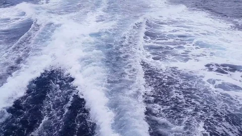 Crew boat sailing causing sea waves Vídeo Stock 82457736