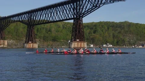 Crew Boats Racing under WWOTH SUnny Stock Footage 80651143