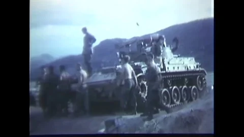 Crew carries ammunition box in multiple machine gun carriage M55 - 1967 Stock Footage 91593108