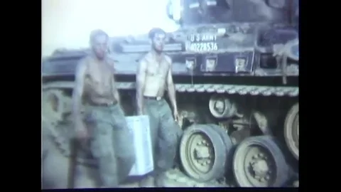 Crew carries ammunition box in multiple machine gun carriage M55 - 1967 Stock Footage 91593137