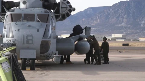Crew with CH-53 Super Stallion parked at Peterson Air Force Base Stock Footage 101374666