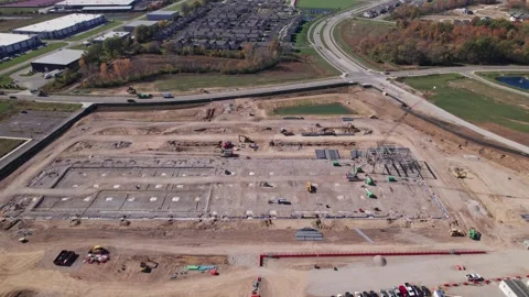 Crew constructing and building new data center for tech company drone Stock Footage 341598209