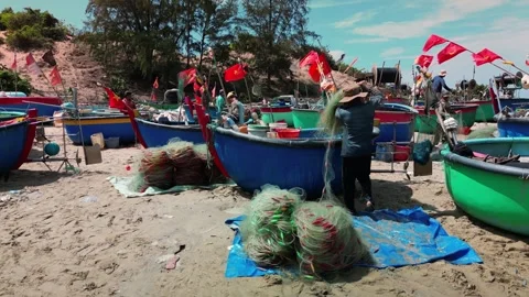 Crew of fishermen is working sorting out fishing nets are preparing to fish from Stock Footage 243187219