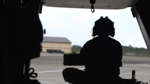 Crew from Hurlburt Field's 8 SOS preflight a Bell-Boeing CV-22 - 2014 库存影片 100749275