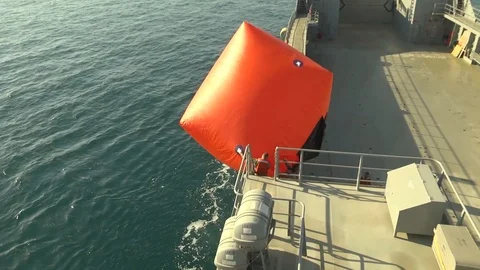 Crew launch inflatable target from U.S. Army LSV5 Maj Gen Charles P Gross Stock Footage 104855399