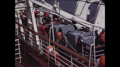 Crew in Life Vests Wait on Deck Video stock 47644426