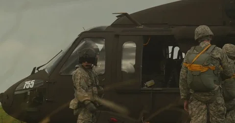 Crew Loading Black Hawk Helicopter Video stock 84032643