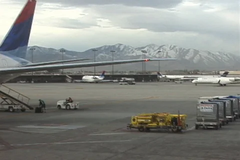 Crew Loading Luggage at Salt Lake City Airport Stock Footage 93517023