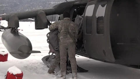 Crew loading UH-60 Blackhawk with kit Video stock 87019742
