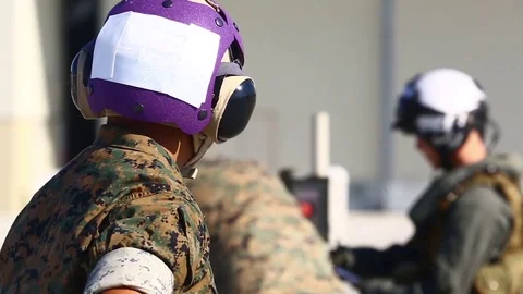 Crew members coordinate with each other to refuel MV - 22 aircraft - 2017 Stock Footage 84952792