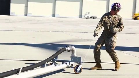 Crew members set the pit to refuel MV - 22 aircraft - 2017 Stock Footage 84952810