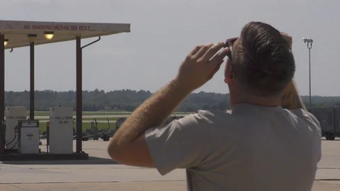 Crew members watching solar eclipse at Seymour Johnson Air Force Base - 2017 Stock Footage 86403533