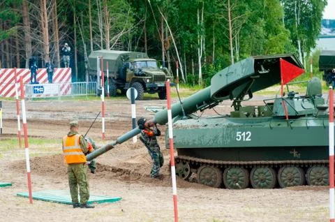 Crew of Meteorite UR-77 machine loads shells Stock Photos