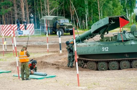 Crew of Meteorite UR-77 machine loads shells Stock Photos