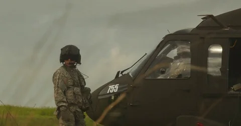 Crew Outside Black Hawk Helicopter Pt. 2 Video stock 84032944
