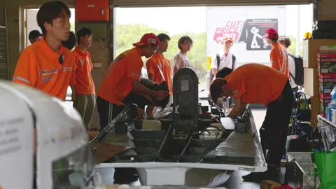 Crew in Pitstop at World Solar Challenge Darwin Race Track - Australia Stock Footage 263226036