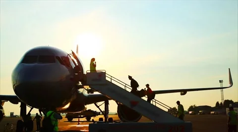 The crew of the plane lifts Stock Footage 53867034