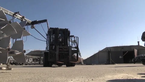 Crew prepare explosive to load in forklift at The Air Dominance Center - 2015 Stock Footage 101168721