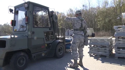 Crew prepare explosive to load in forklift at The Air Dominance Center - 2015 Stock Footage 101168742