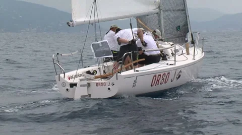 Crew of sailing boat manoeuvring Stock Footage 36971489