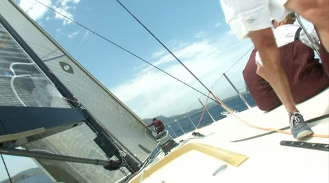 Crew of sailing boat standing on the side of the boat during regatta Stock Footage 36176638