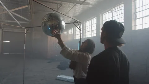 Crew Setting Up Disco Ball Stock Footage 270328573