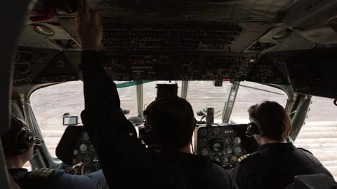 Crew of a transport helicopter is preparing to take off in the cockpit. Stock Footage 171879209