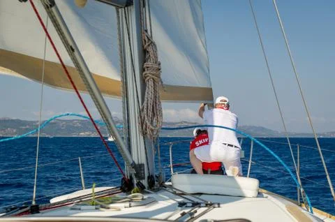 Crew work at sailing race Stock Photos