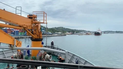 The crew worked to prepare for the ship to dock Stock Footage 320451139