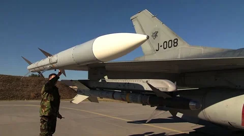 Crewchief checking Missels on a F16 Jet Fighter (two shots) Video stock 43216121
