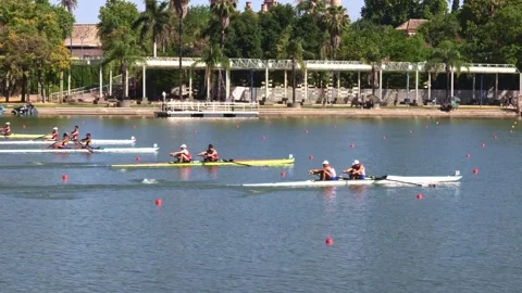 Crews fight for position in Seville regatta Stock Footage 336098853