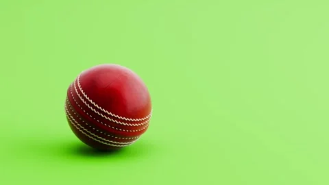 Cricket Ball Rolling from Left and from Right and Stopping on Green Video stock 335288183