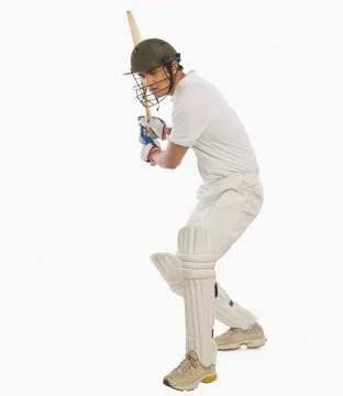 Cricket batsman playing a stroke Stock Photos