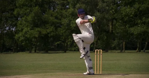 A Cricket Batsman Strikes the ball. Vídeo Stock 80427086