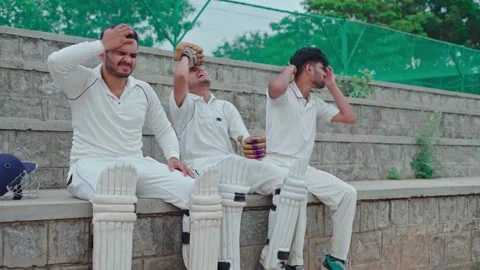 Cricket players got sad due to loss of wicket in team while watching cricket Stock Footage 251644690