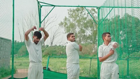 Cricket players warming up before they start training in field , in the morning Stock Footage 251645201