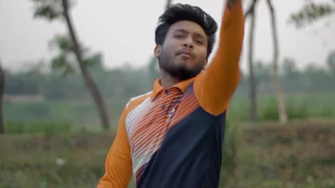 A cricketer disappointed with his teammate in a local cricket games Stock Footage 293939717