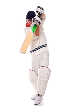Cricketer playing a shot Stock Photos