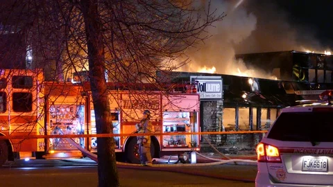 Crime scene of an arson targeted attack in Laval, Quebec, Canada Stock Footage 129987820